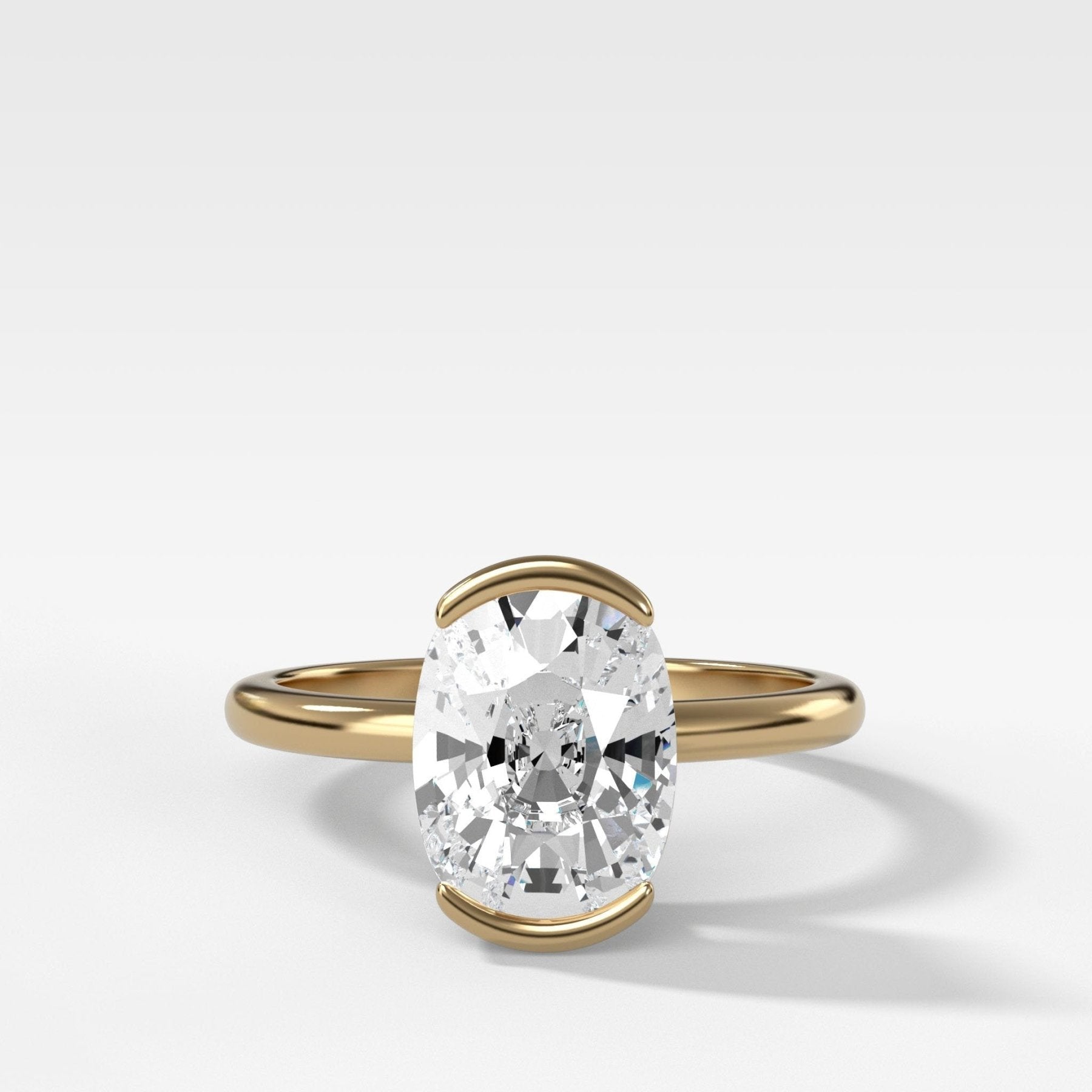 North South Half Bezel Solitaire Engagement Ring With Elongated Cushion Cut Diamond - GOODSTONE