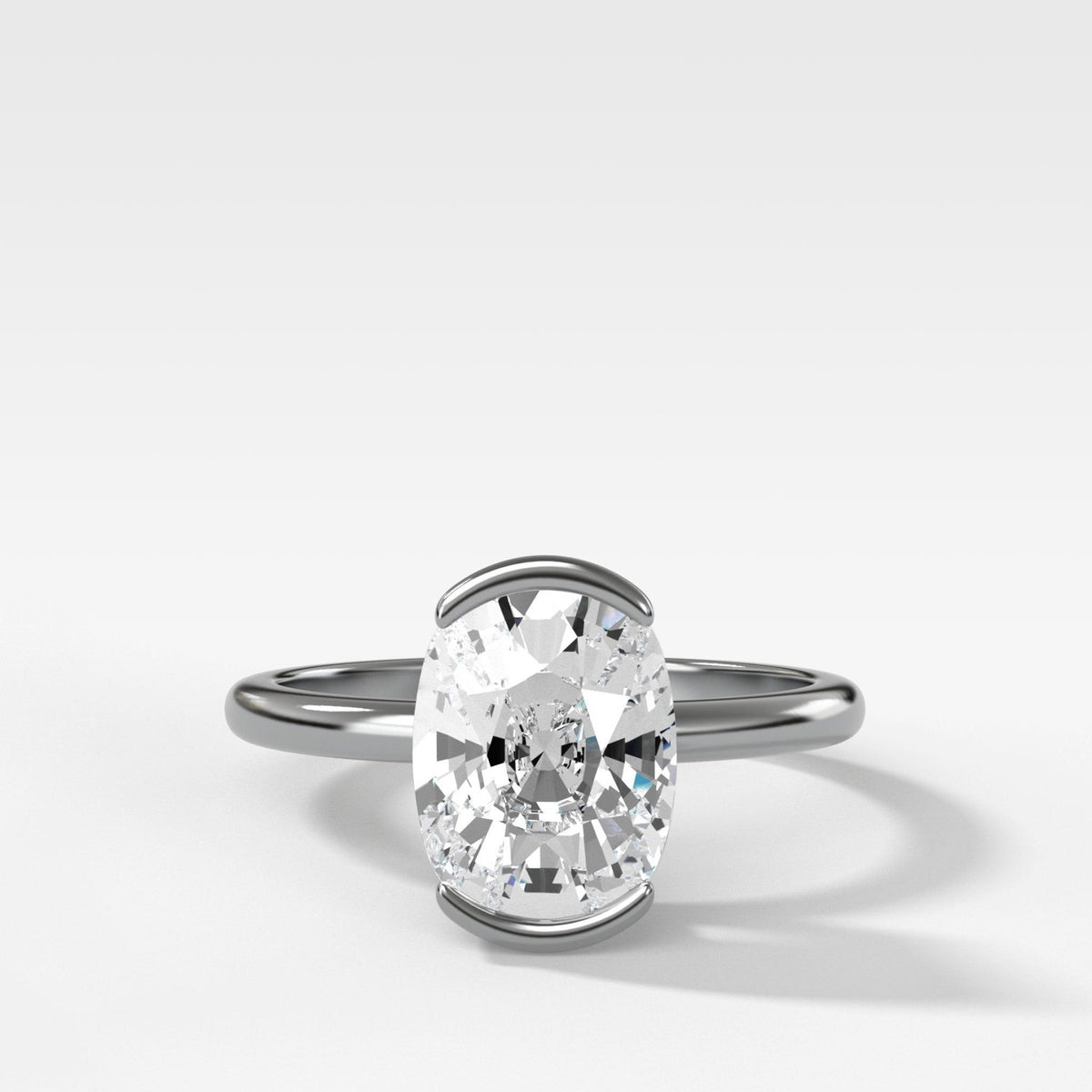 North South Half Bezel Solitaire Engagement Ring With Elongated Cushion Cut Diamond - GOODSTONE