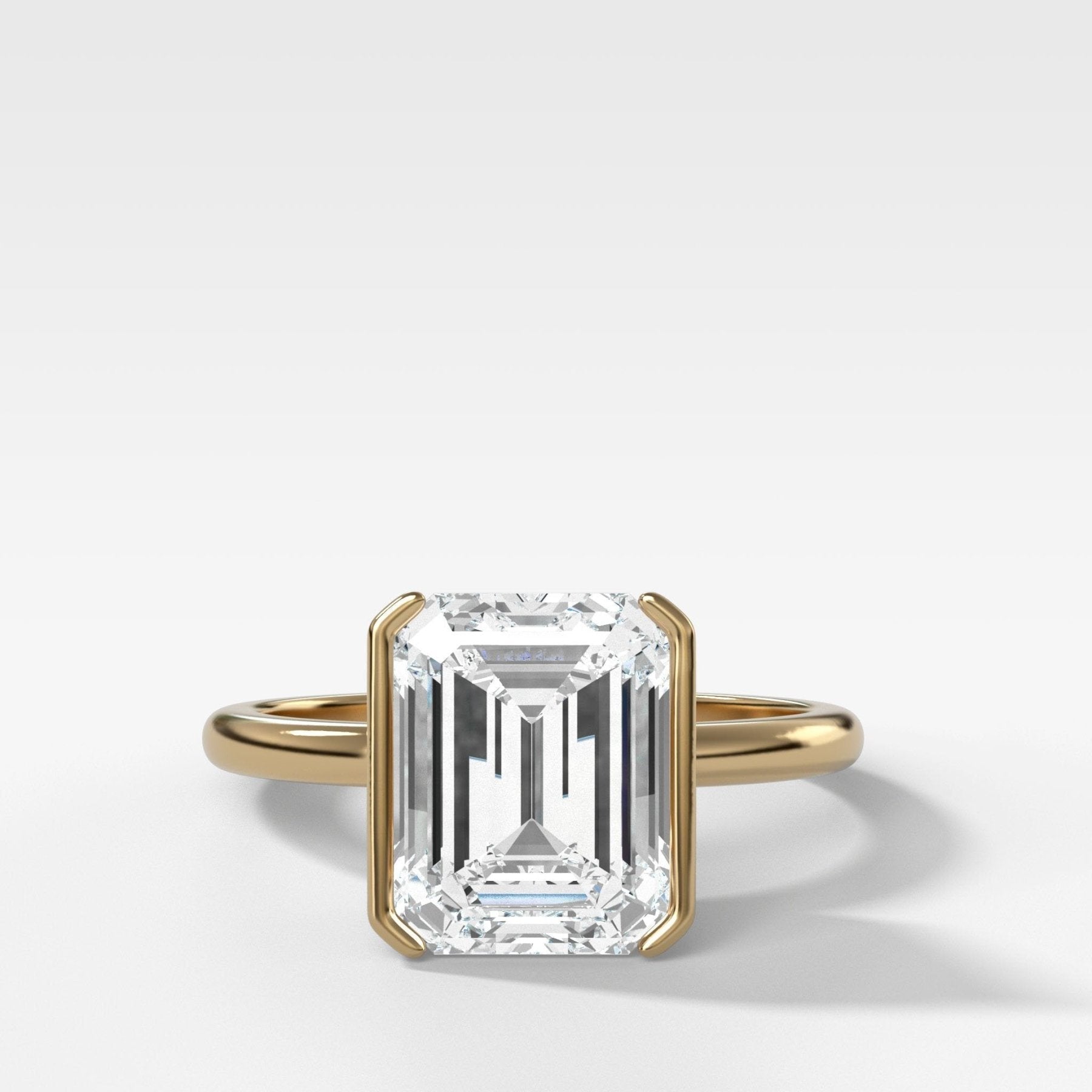 North South Half Bezel Solitaire Engagement Ring With Emerald Cut Diamond - GOODSTONE