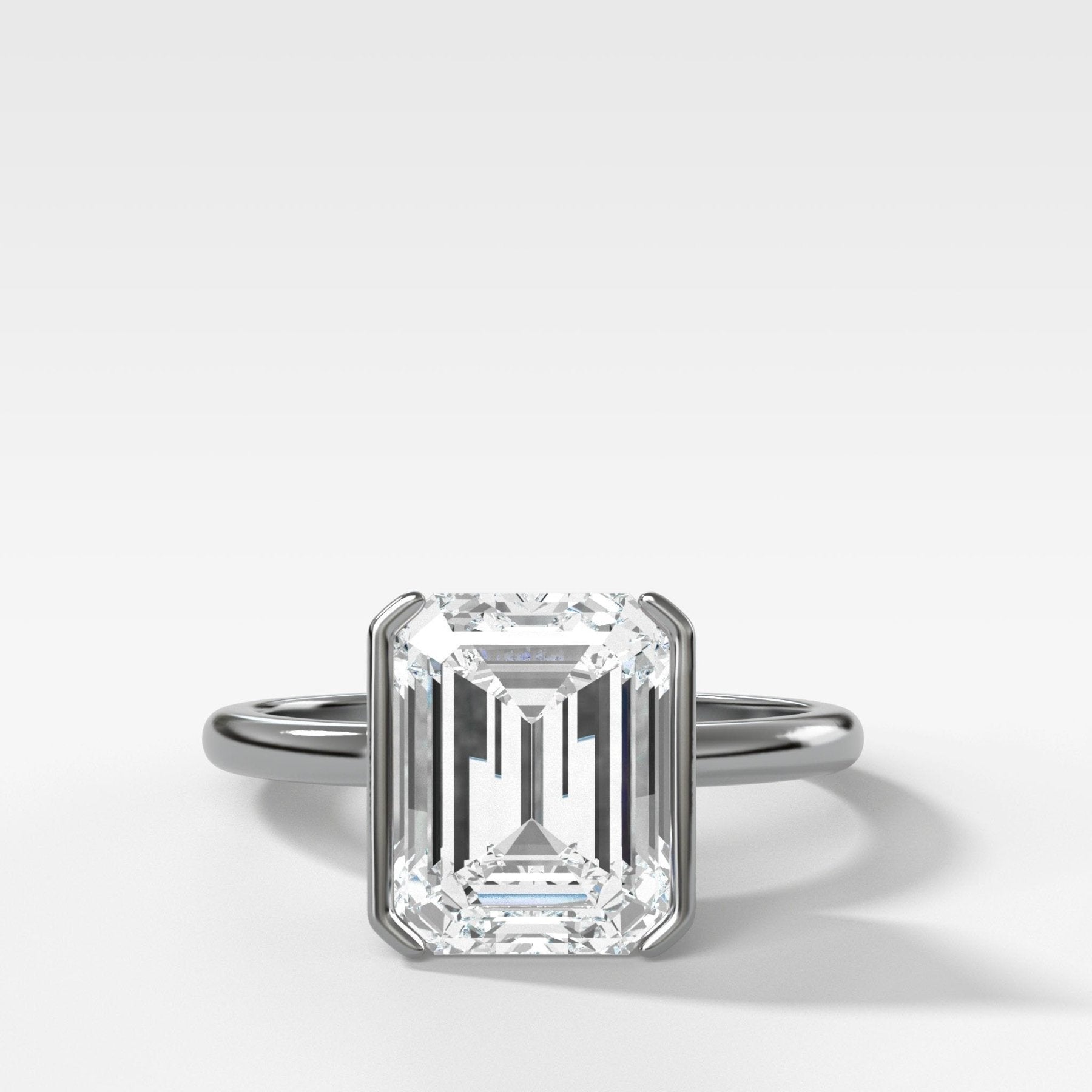 North South Half Bezel Solitaire Engagement Ring With Emerald Cut Diam