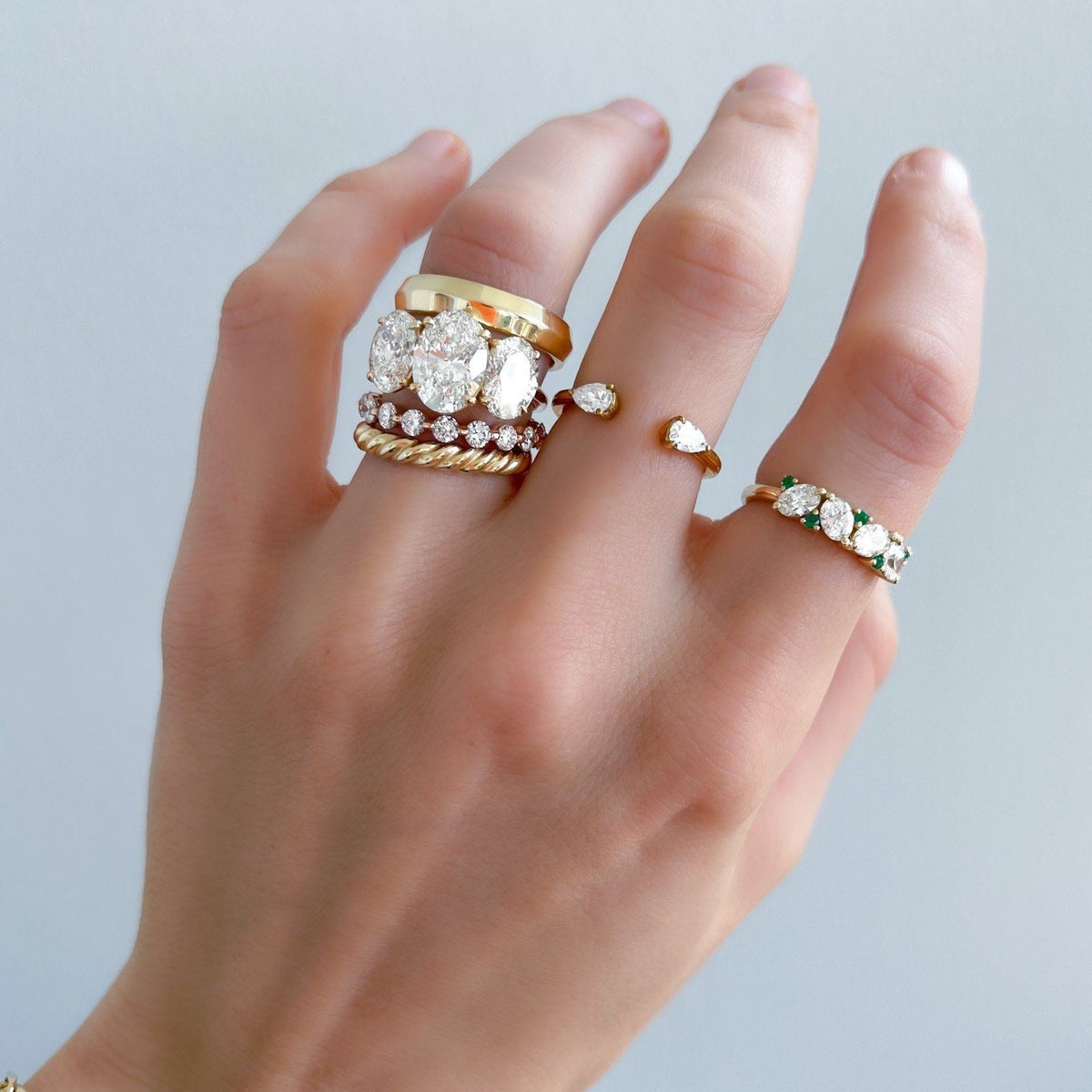 Oval Diamond And Green Emerald Medley Halfway Wedding Band - GOODSTONE