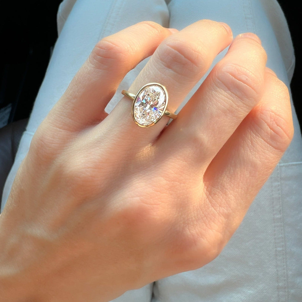 Penumbra Bezel Set Engagement Ring With Oval Cut - GOODSTONE