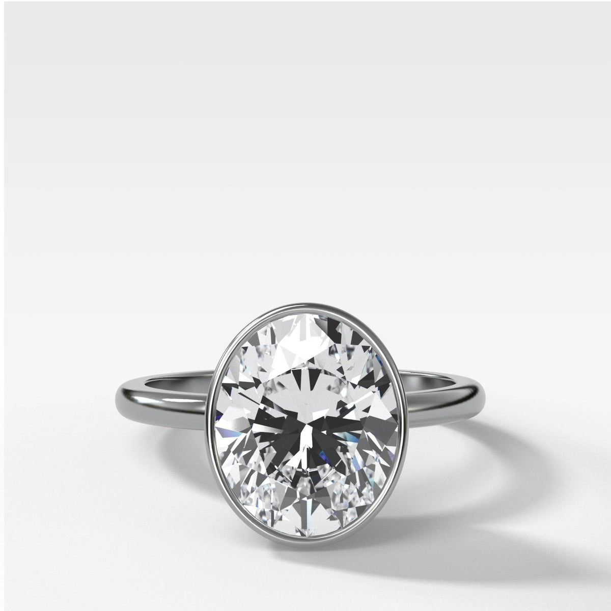 Penumbra Bezel Set Engagement Ring With Oval Cut - GOODSTONE