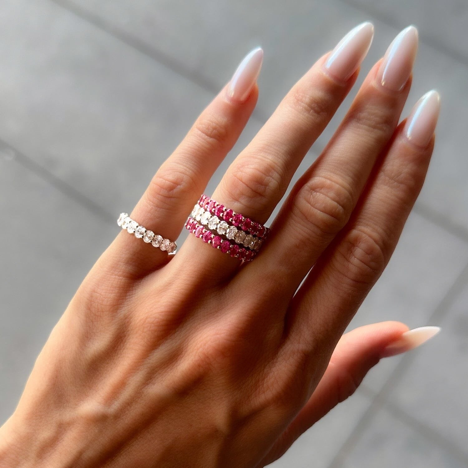 Petite Shared Prong Wedding Band with Pink Sapphire Oval Gemstones - GOODSTONE