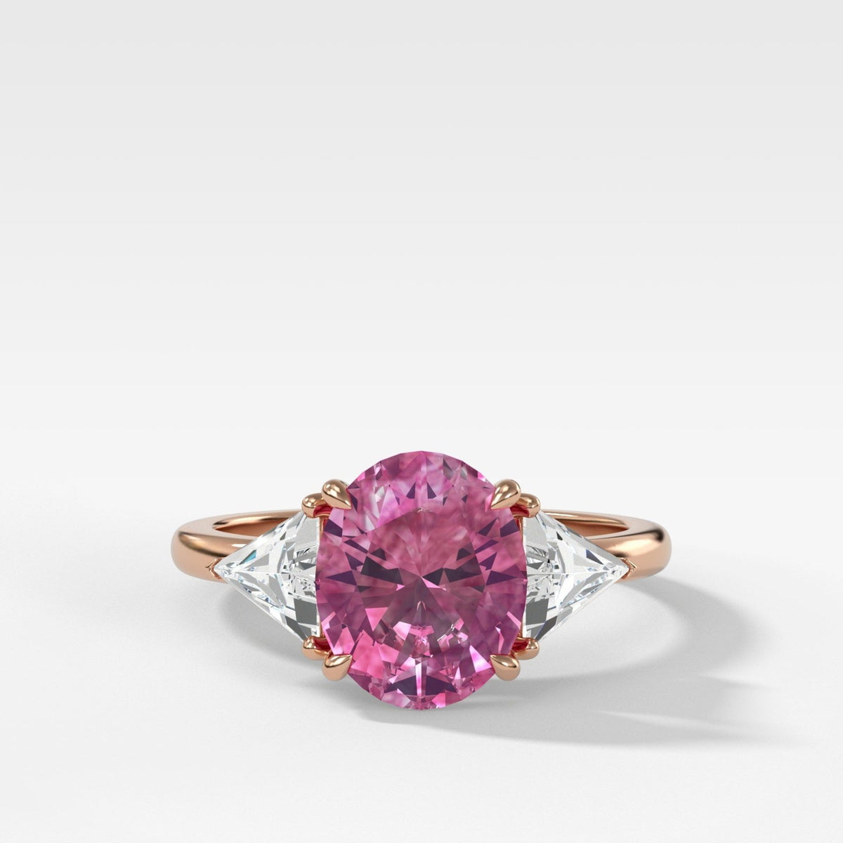 Pink Sapphire Three Stone Ring With Oval Cut And Trillion Diamond Sides - GOODSTONE