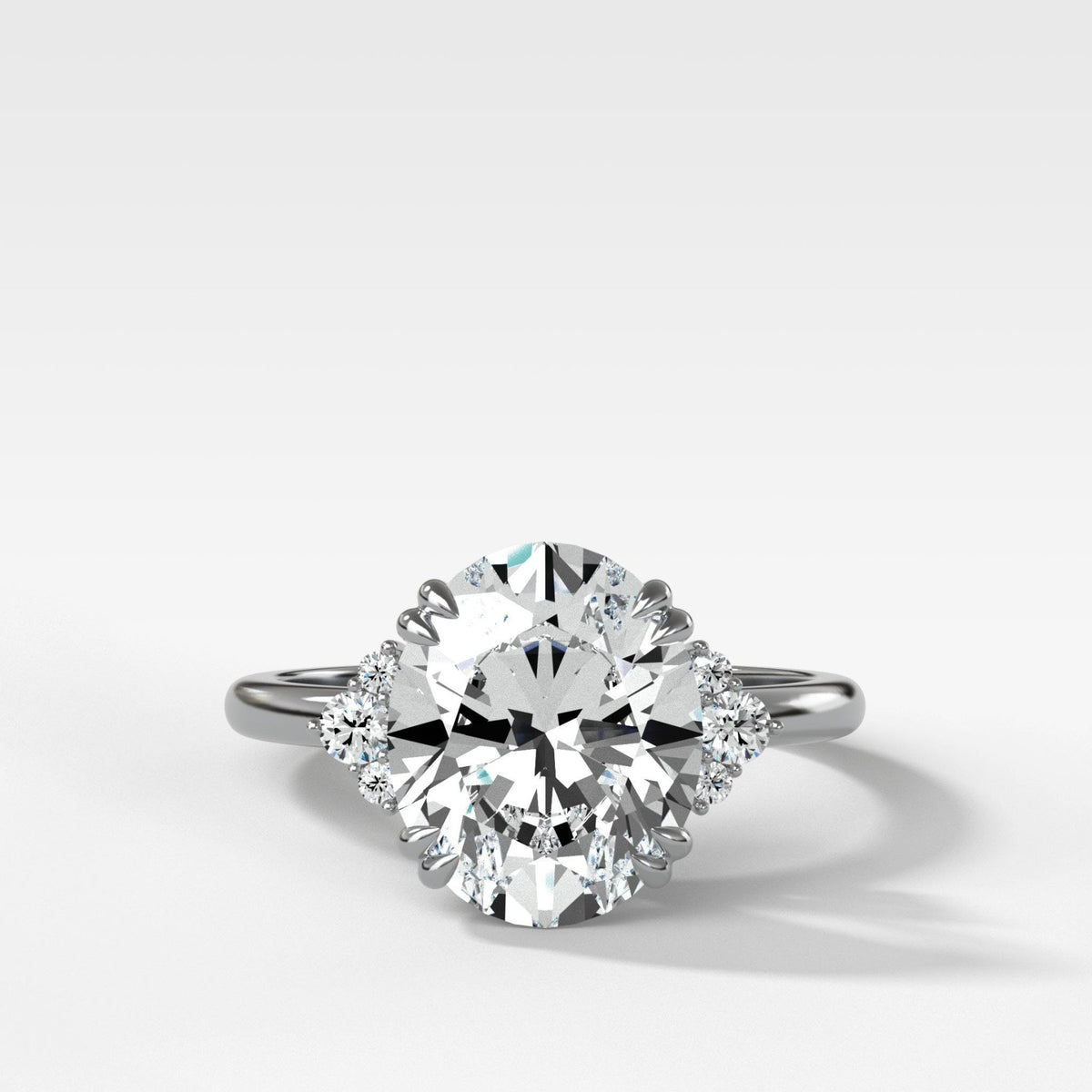 Signature Cluster Engagement Ring With Oval Cut Diamond - GOODSTONE