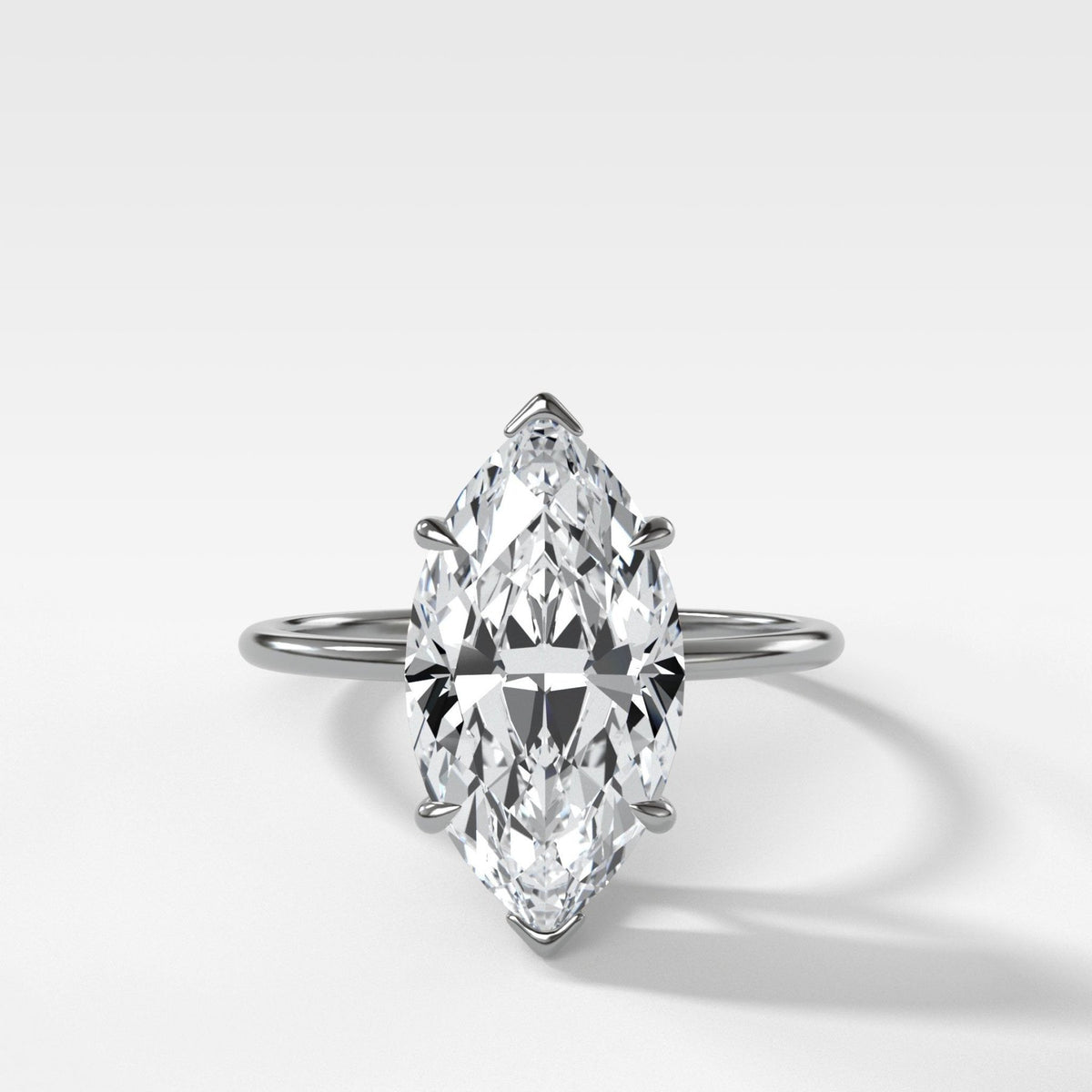 Thin + Simple Solitaire Engagement Ring With Marquise Cut Diamond - GOODSTONE