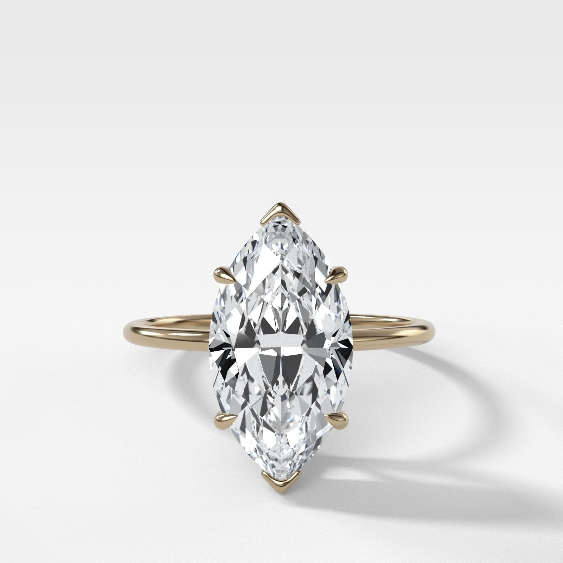 Thin + Simple Solitaire Engagement Ring With Marquise Cut Diamond - GOODSTONE