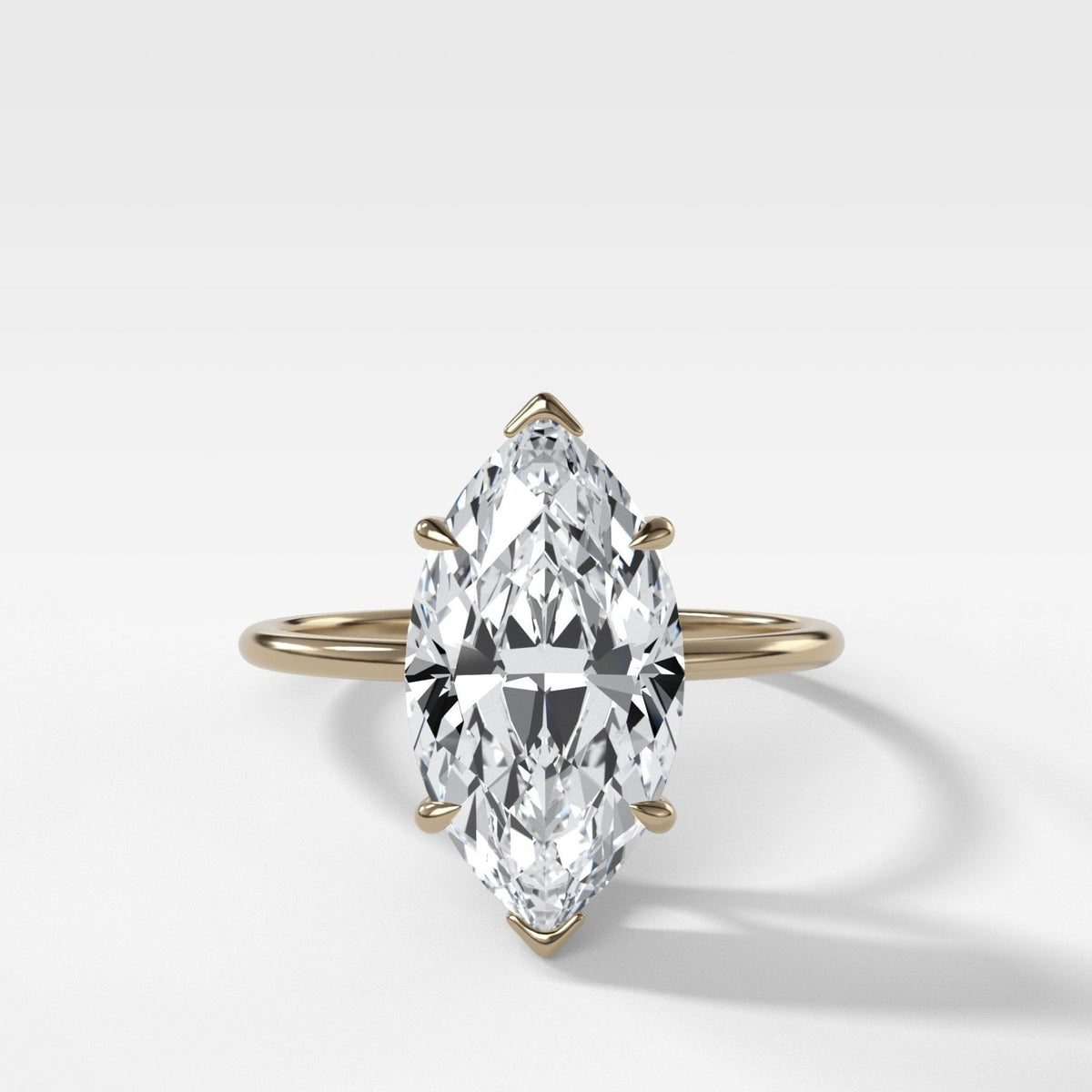 Thin + Simple Solitaire Engagement Ring With Marquise Cut Diamond - GOODSTONE