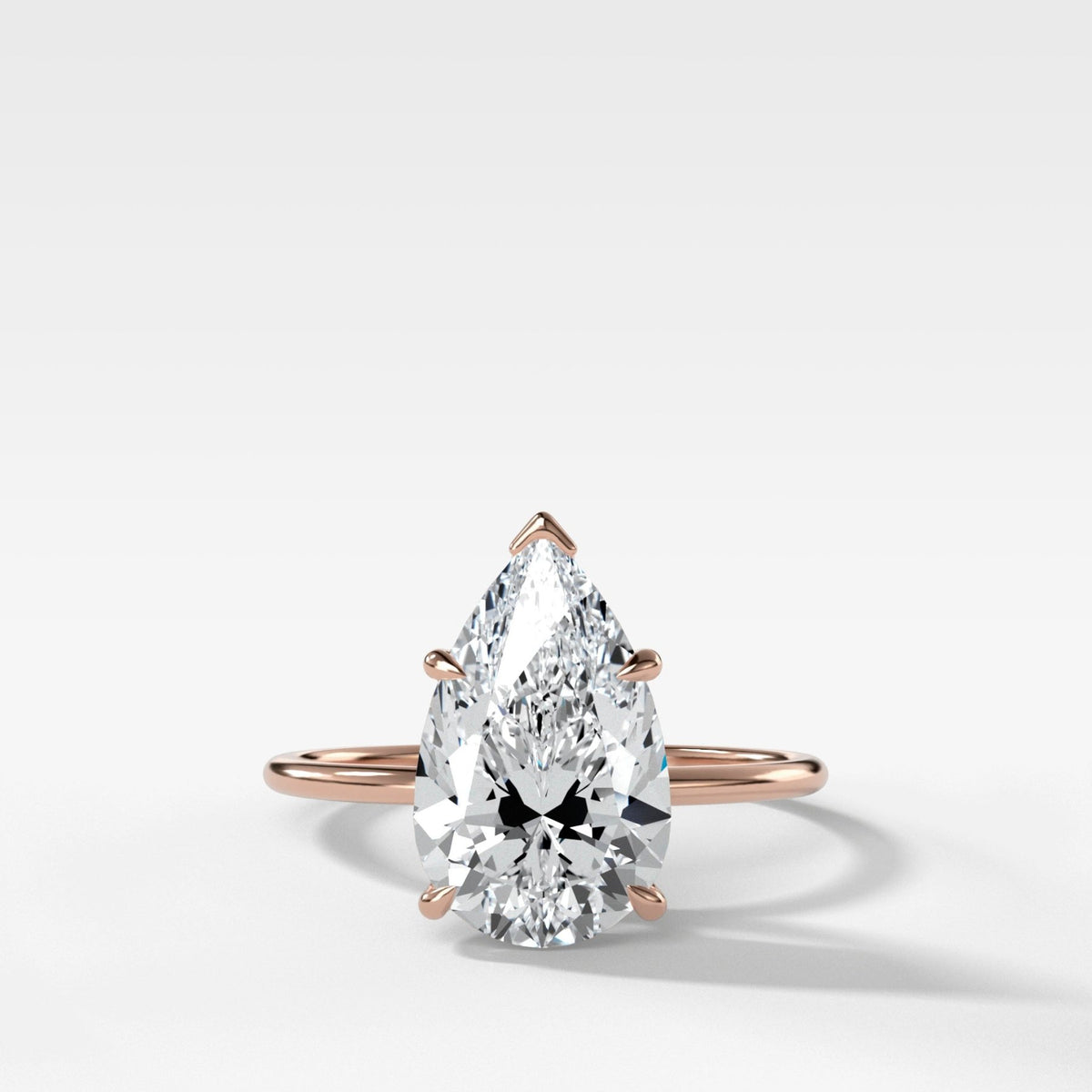 Thin + Simple Solitaire Engagement Ring With Pear Cut Diamond - GOODSTONE