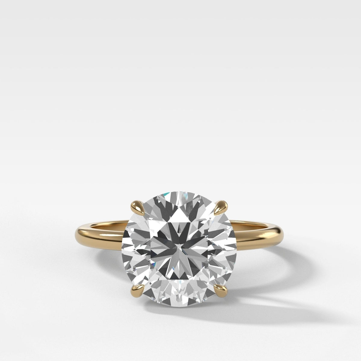 Thin + Simple Solitaire Engagement Ring With Round Brilliant Cut Diamond