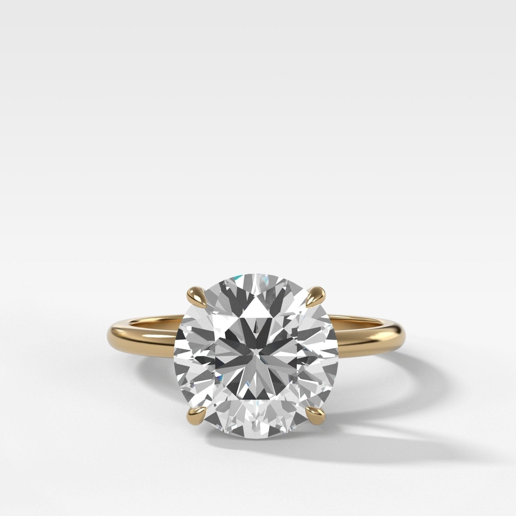 Thin + Simple Solitaire Engagement Ring With Round Brilliant Cut Diamond - GOODSTONE