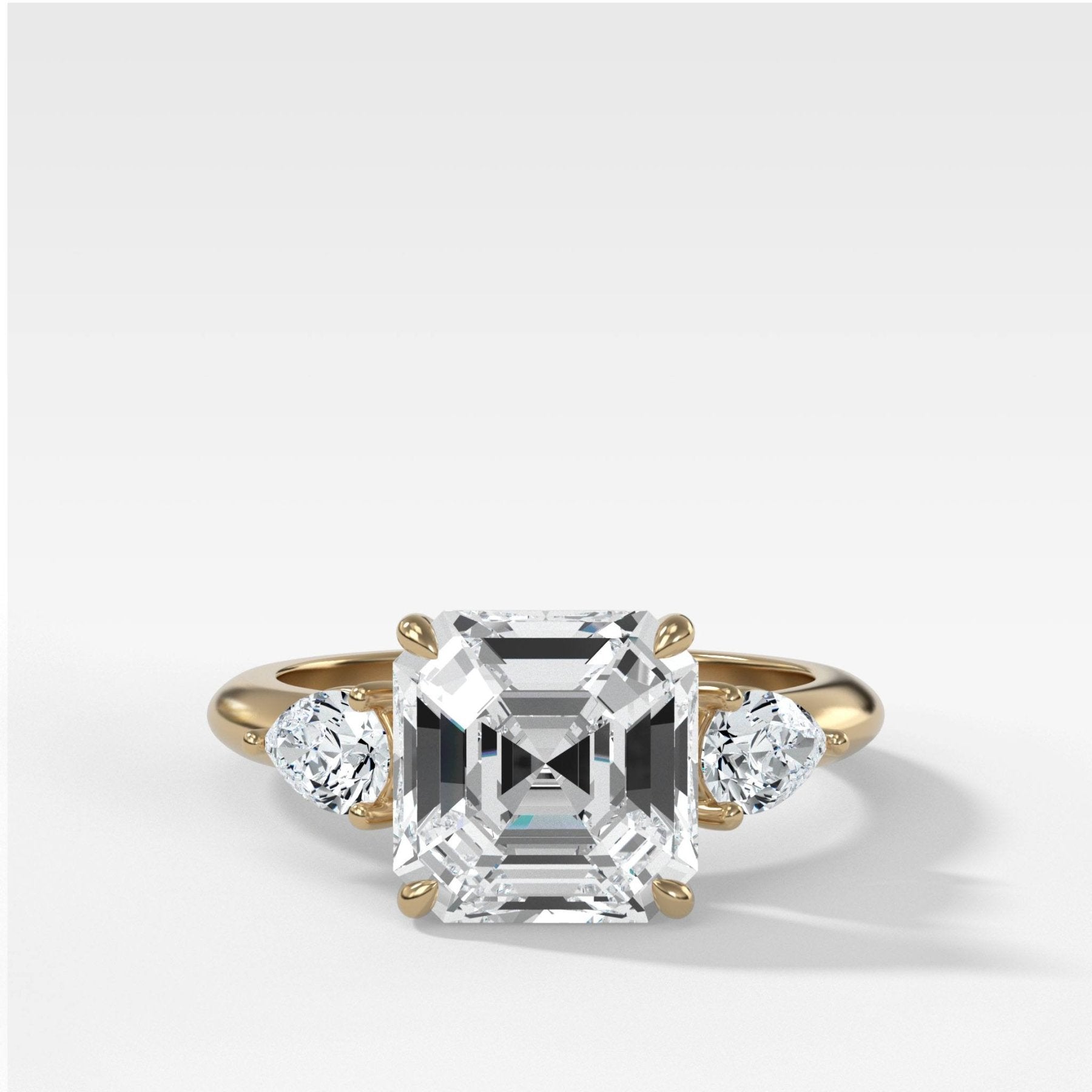 Three Stone Engagement Ring With Pear Side Stones and Asscher Cut Diamond - GOODSTONE