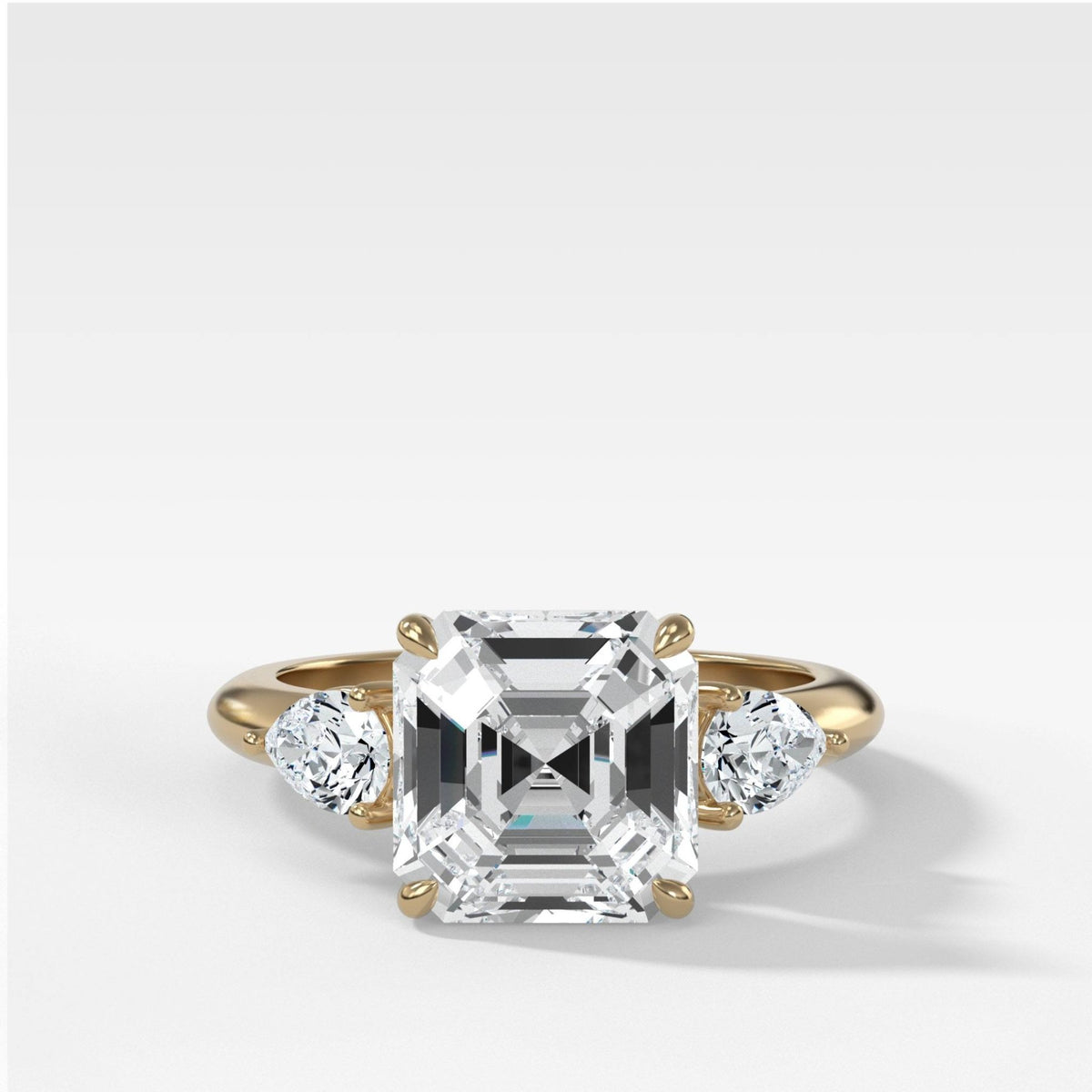 Three Stone Engagement Ring With Pear Side Stones and Asscher Cut Diamond - GOODSTONE