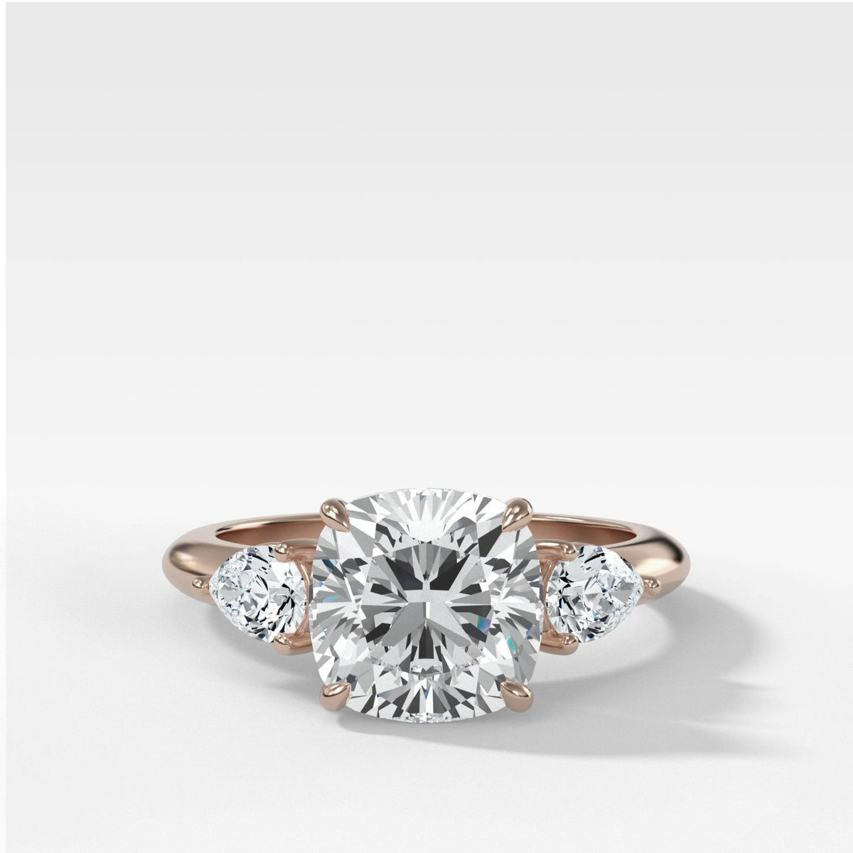 Three Stone Engagement Ring With Pear Side Stones and Cushion Cut Diamond - GOODSTONE
