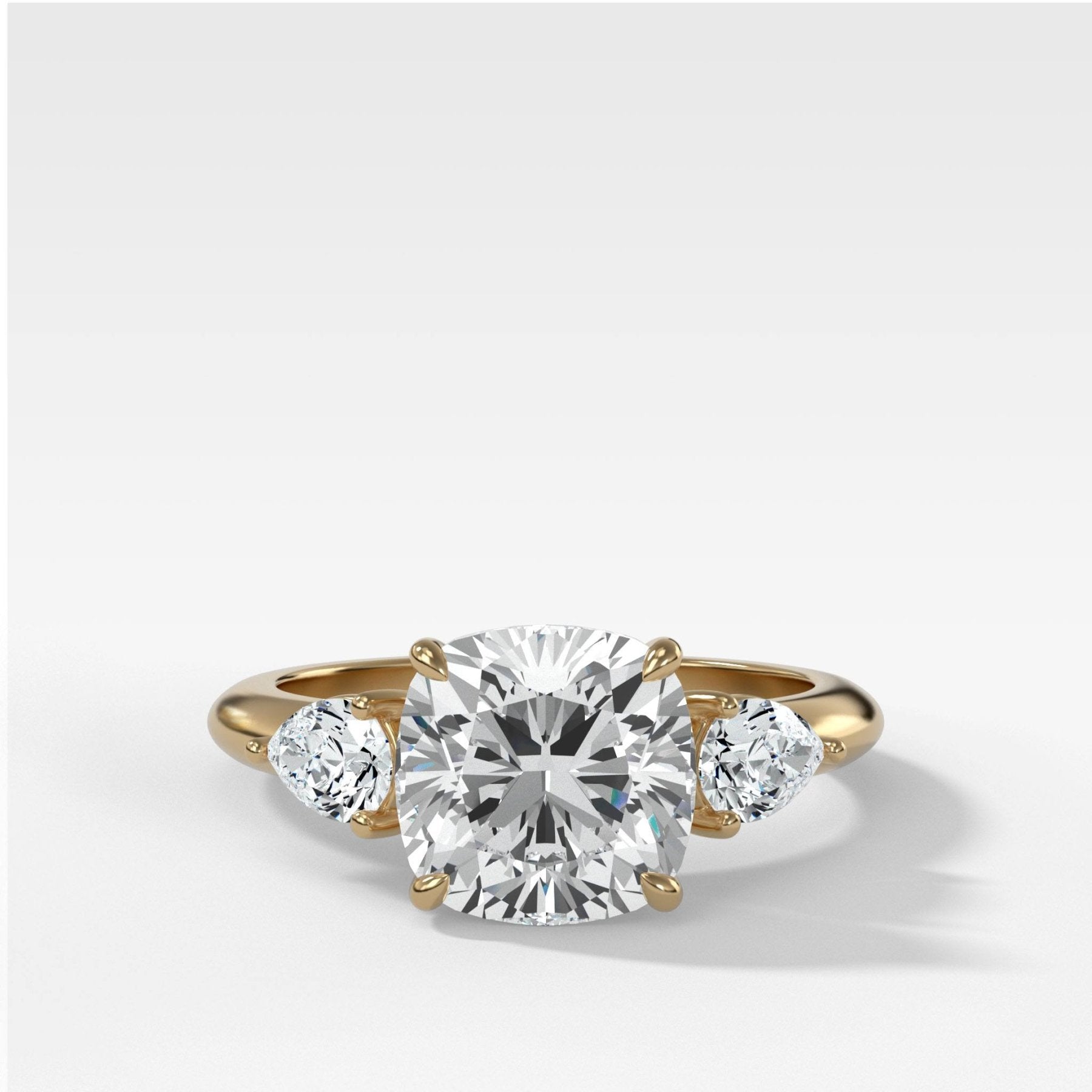Three Stone Engagement Ring With Pear Side Stones and Cushion Cut Diamond - GOODSTONE