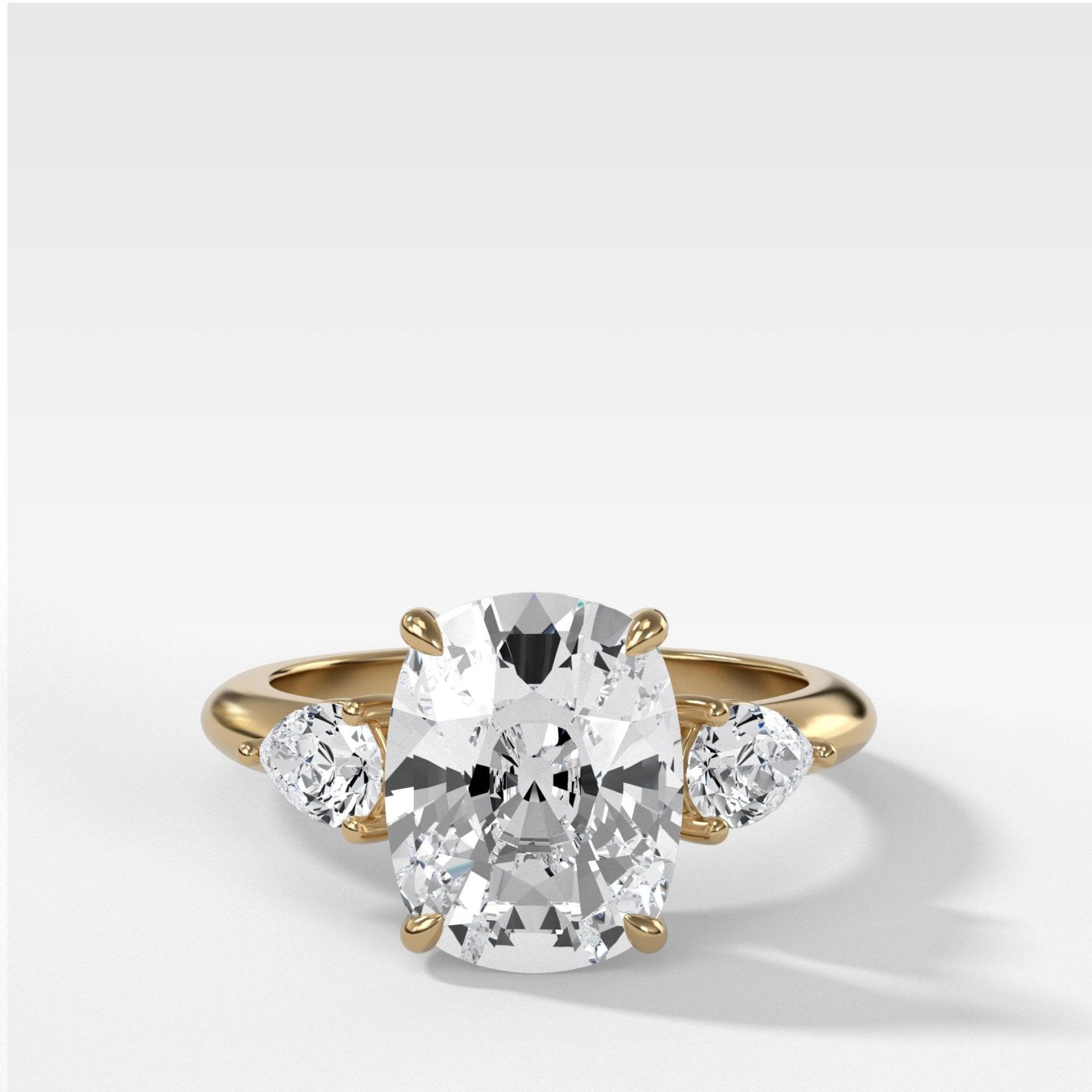 Three Stone Engagement Ring With Pear Side Stones and Elongated Cushion Cut Diamond - GOODSTONE