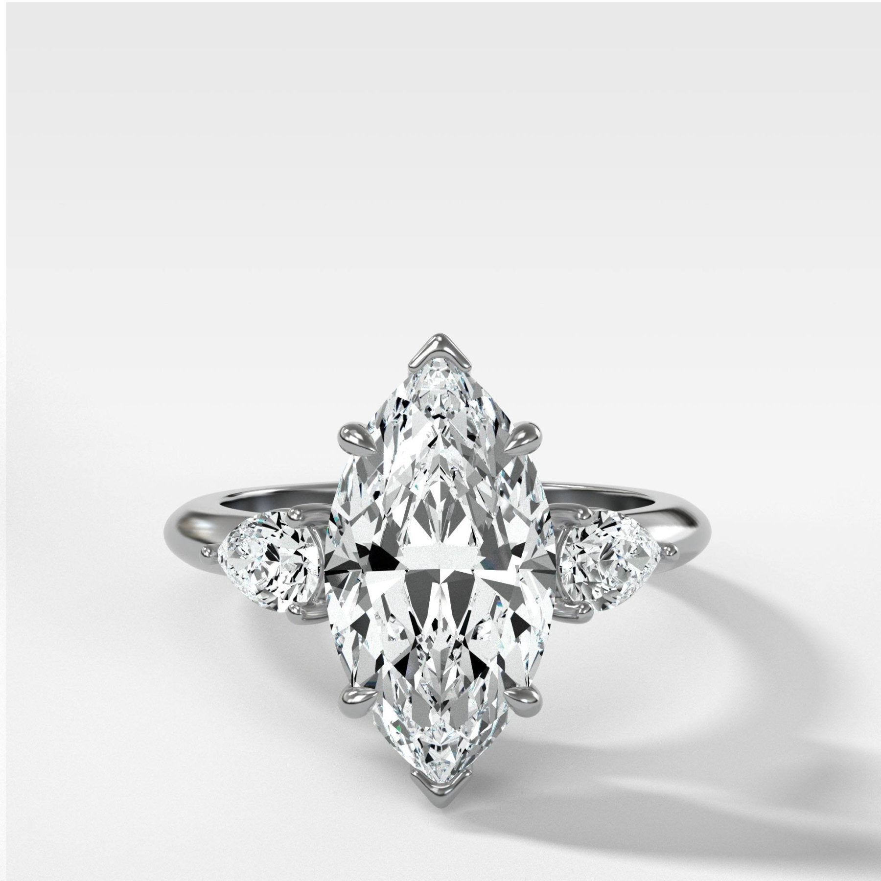 Three Stone Engagement Ring With Pear Side Stones and Marquise Cut Diamond - GOODSTONE