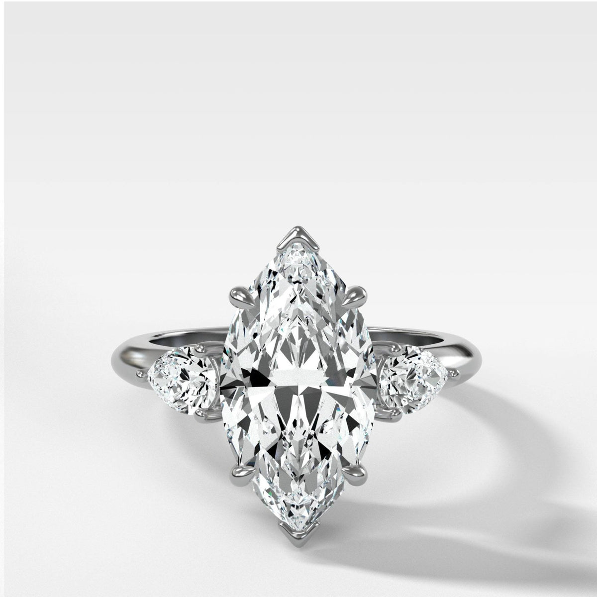 Three Stone Engagement Ring With Pear Side Stones and Marquise Cut Diamond - GOODSTONE