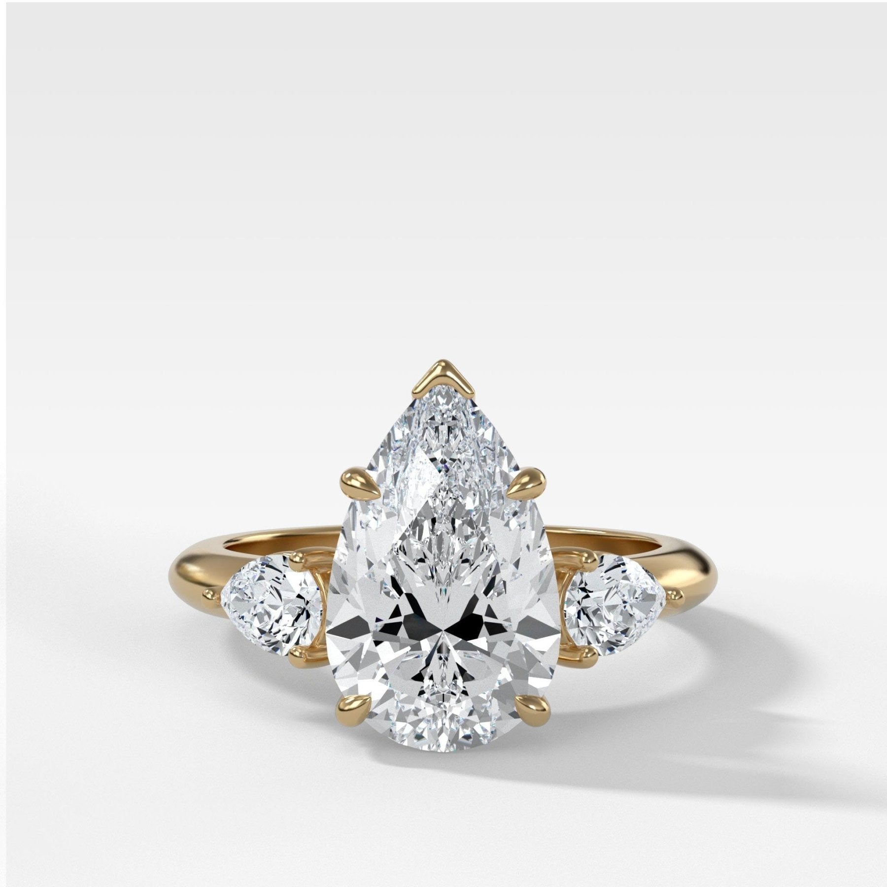 Three Stone Engagement Ring With Pear Side Stones and Pear Cut Diamond - GOODSTONE