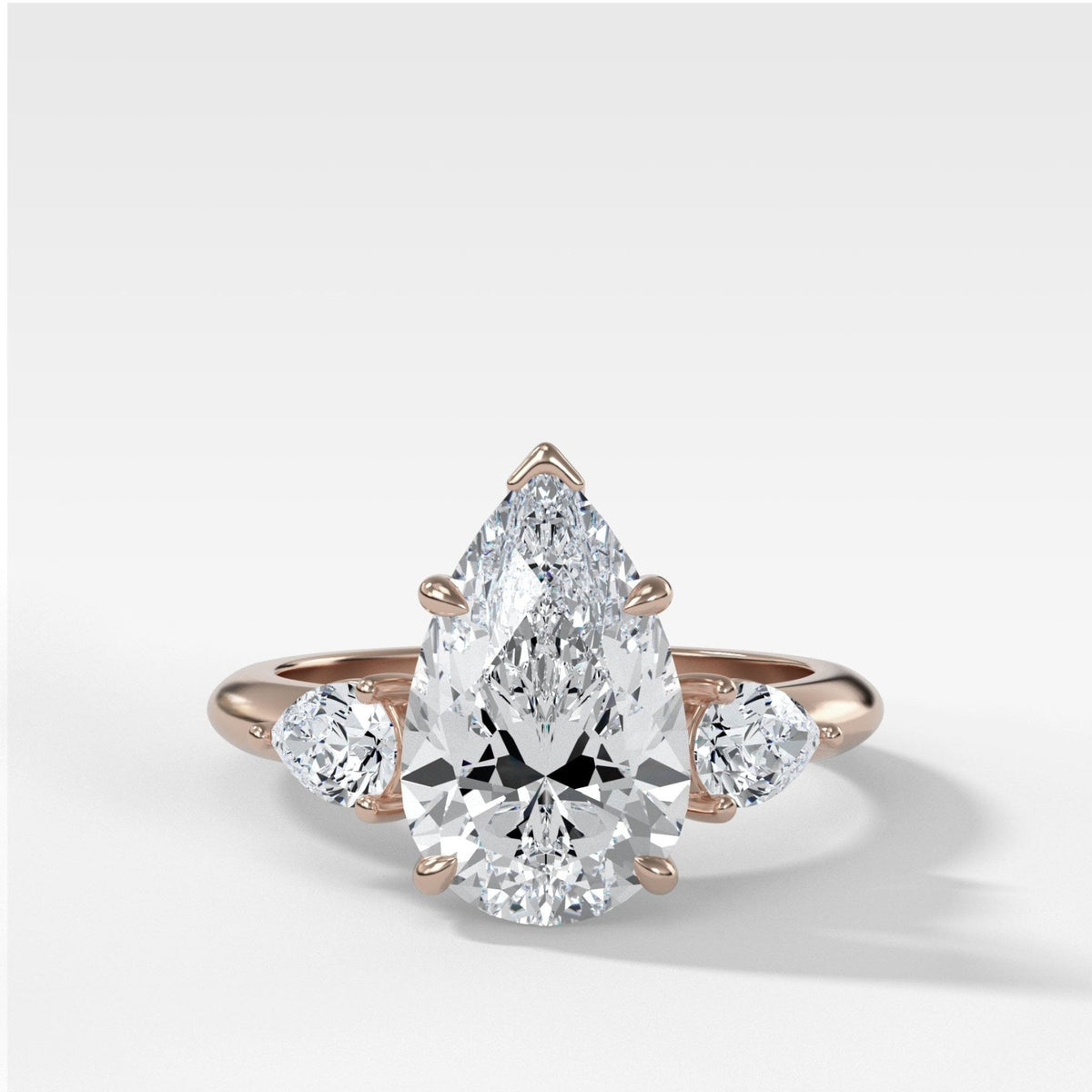 Three Stone Engagement Ring With Pear Side Stones and Pear Cut Diamond - GOODSTONE