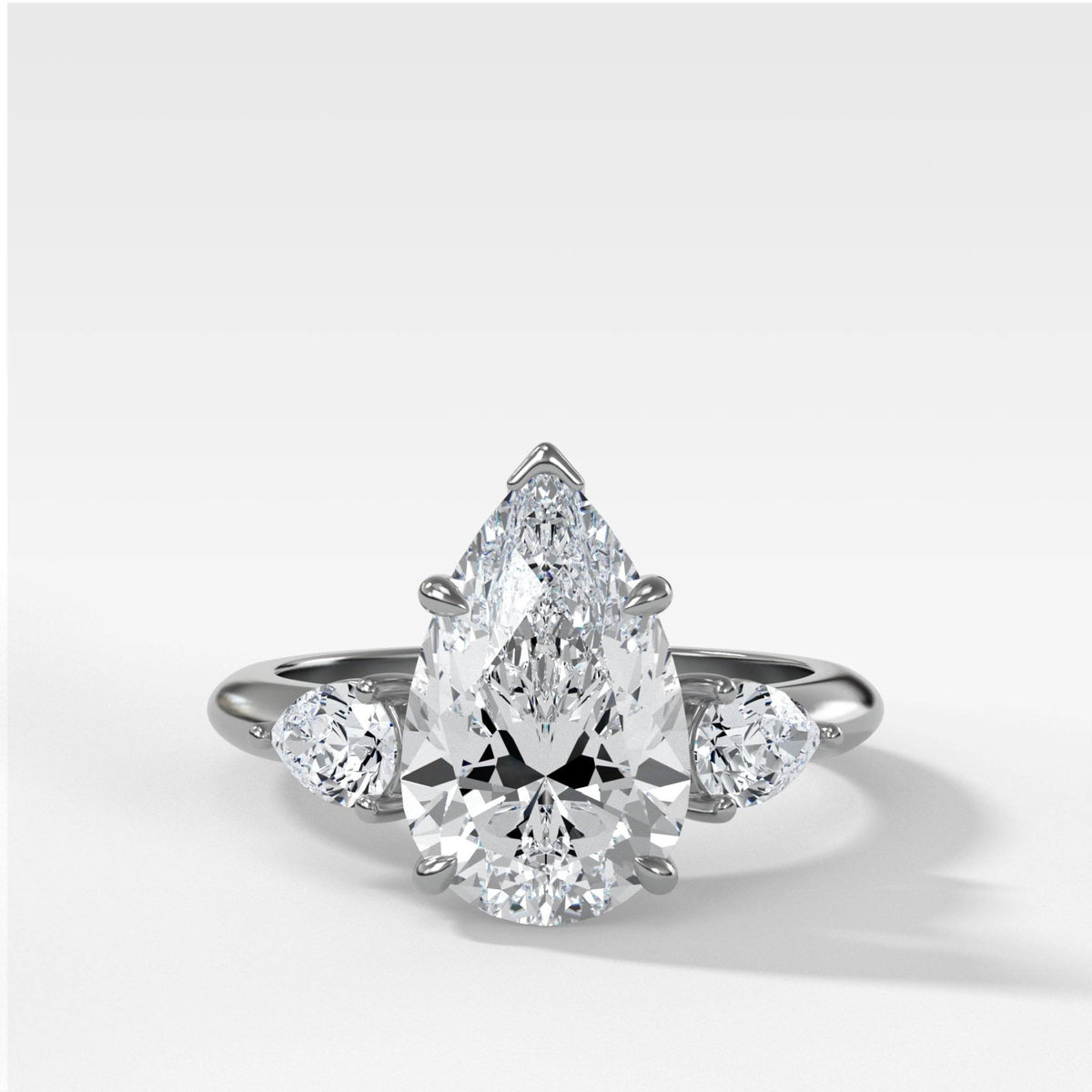 Three Stone Engagement Ring With Pear Side Stones and Pear Cut Diamond - GOODSTONE