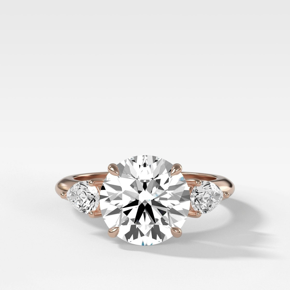 Three Stone Engagement Ring With Pear Side Stones With Round Cut Diamond - GOODSTONE