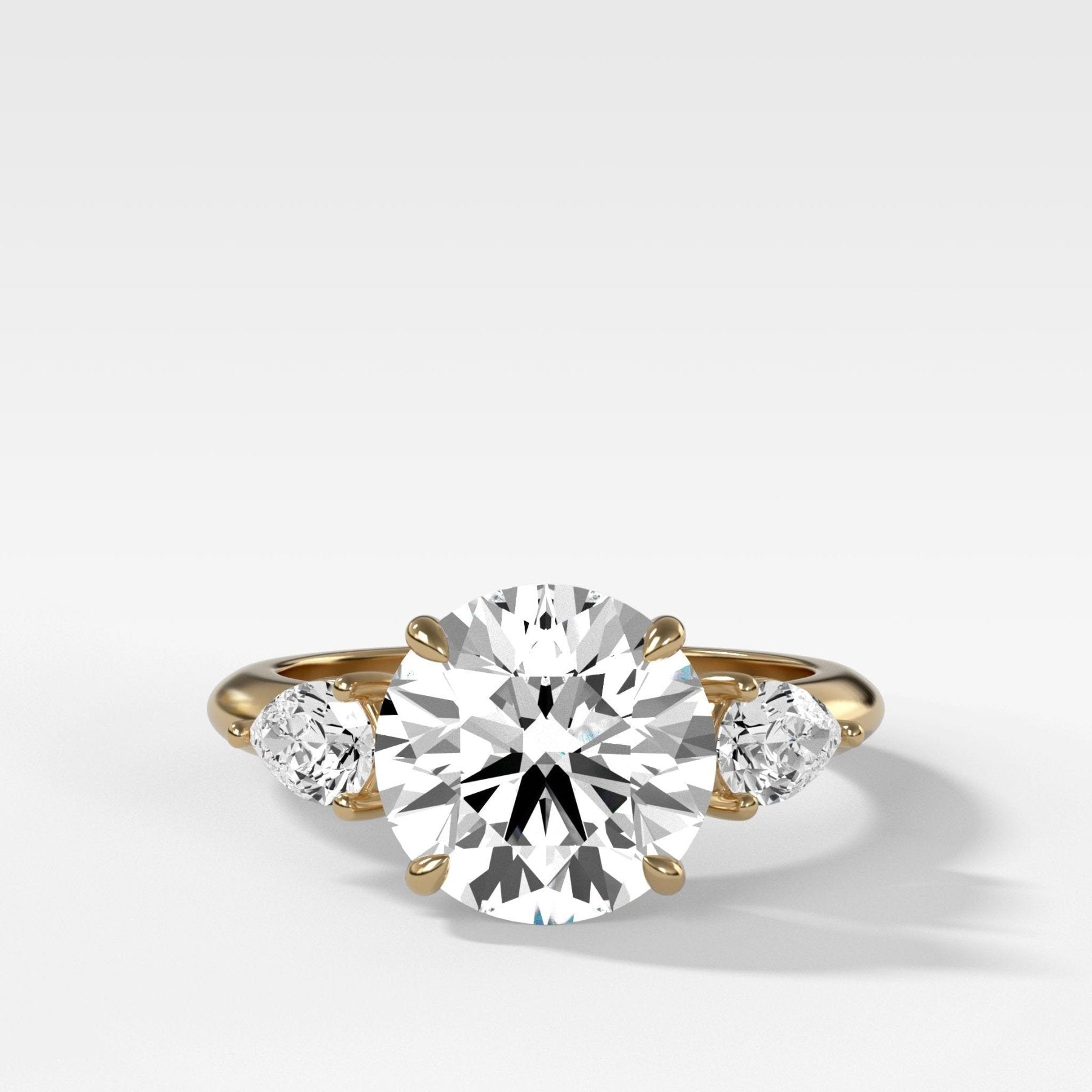 Three Stone Engagement Ring With Pear Side Stones With Round Cut Diamond - GOODSTONE