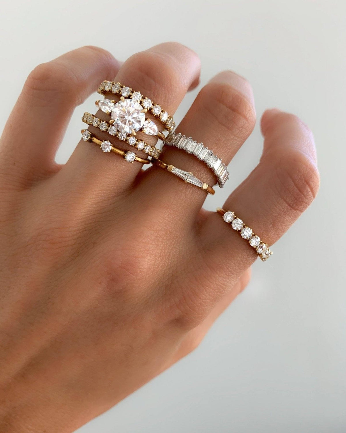 Three Stone Engagement Ring With Pear Side Stones With Round Cut Diamond - GOODSTONE